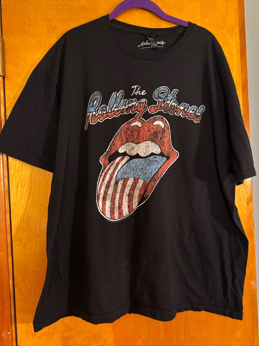 the Rolling Stones Black Tee with Red, White & Blue Tongue Graphic